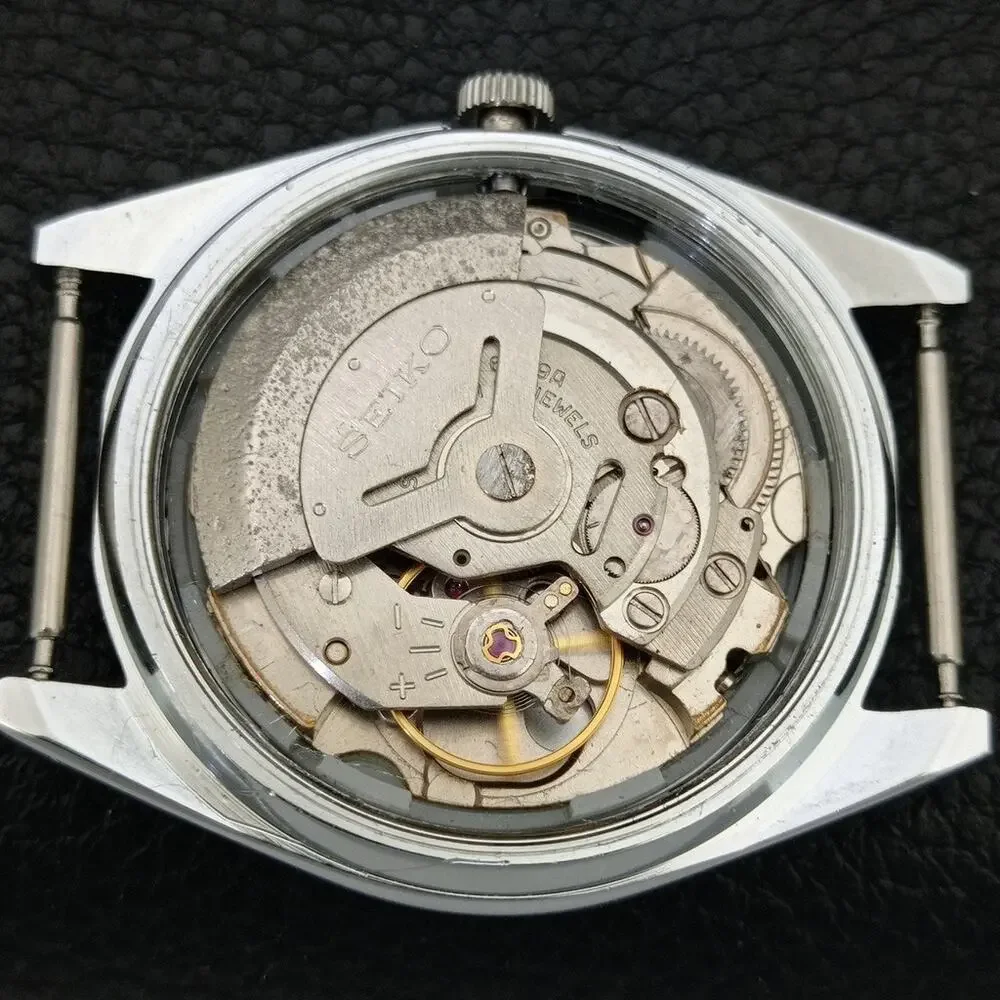 Vintage 1973 Seiko Automatic Mens Silver Watch W/daydate & Arabic accents
